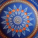 Plate in painted sandstone