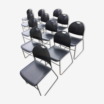 Chairs in black pvc with sleigh legs in metal brand conforto