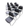 Chaises en pvc noir à piétements traîneau en métal de marque conforto