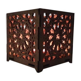 Perforated wooden candlestick