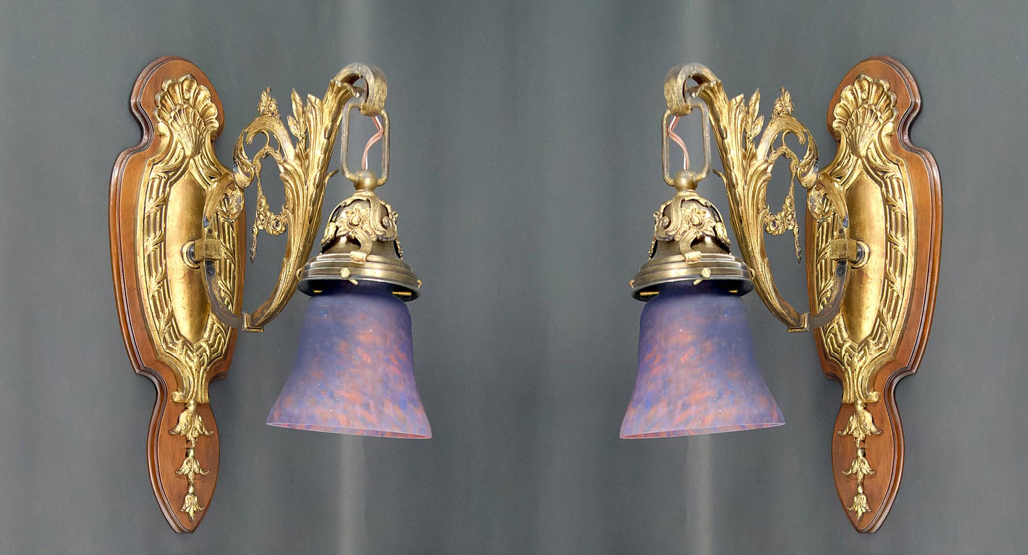 Pair of Rococo / Louis XV wall lights in gilded bronze, walnut bases and glass tulips, France, Circ