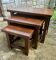 Set of 3 nesting coffee tables in oak.
