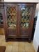 Two-door glass cabinet in solid wood