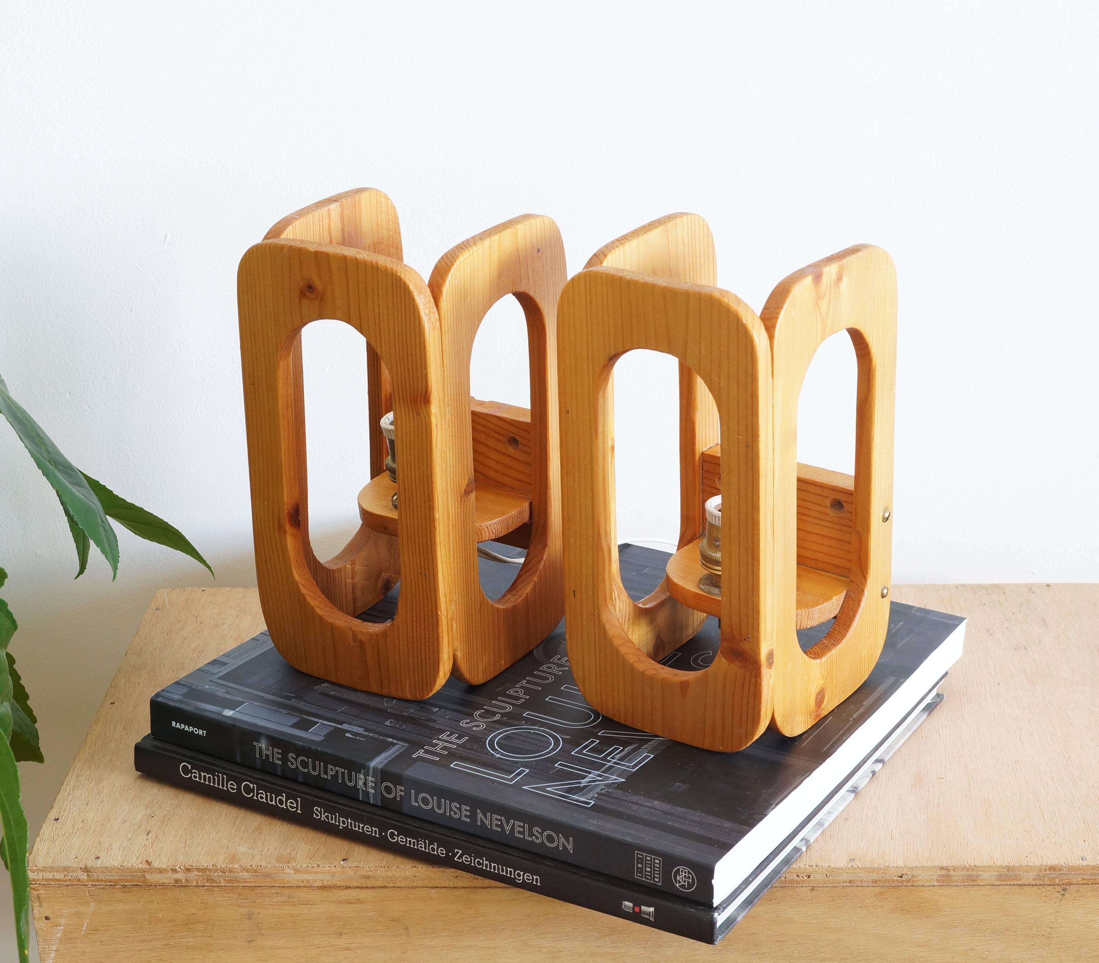 Two Scandinavian pine wall lamps in the 70s