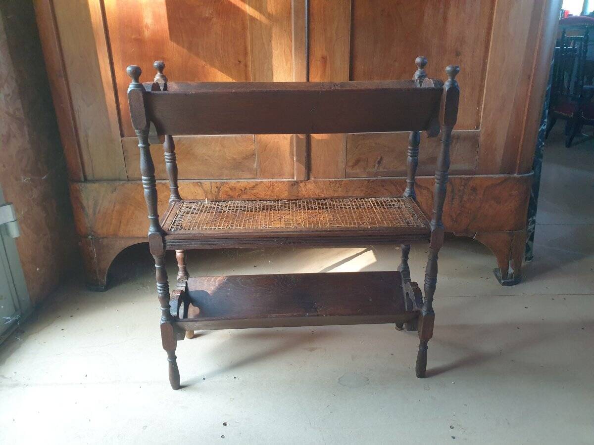 Magazine/book rack in oak with a caned top - early 20th century