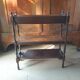 Magazine/book rack in oak with a caned top - early 20th century