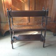 Magazine/book rack in oak with a caned top - early 20th century