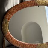 Small oval Art Deco mirror in brown and gold 33x54.