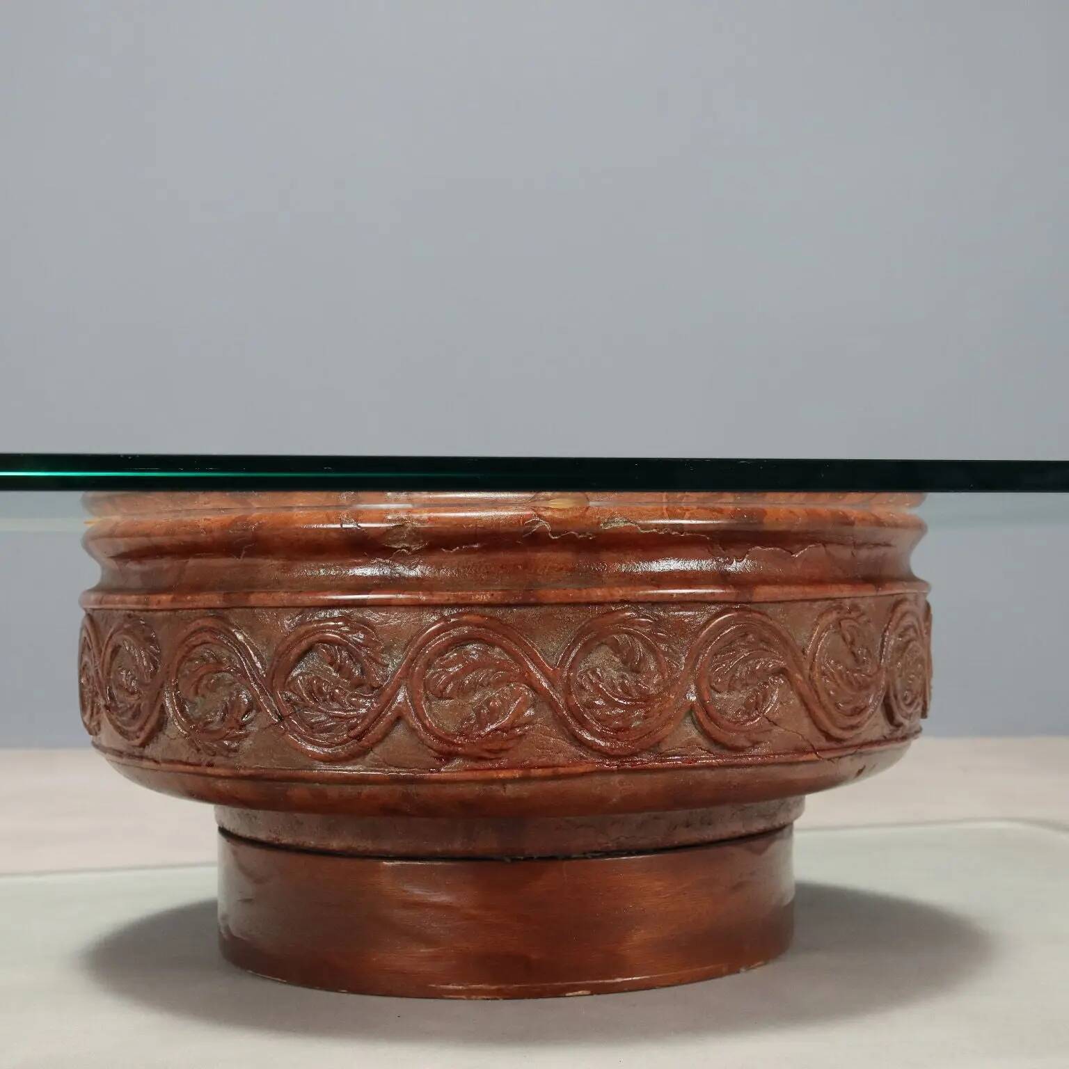 Vintage coffee table with a glass top and a terracotta base, 20th century.