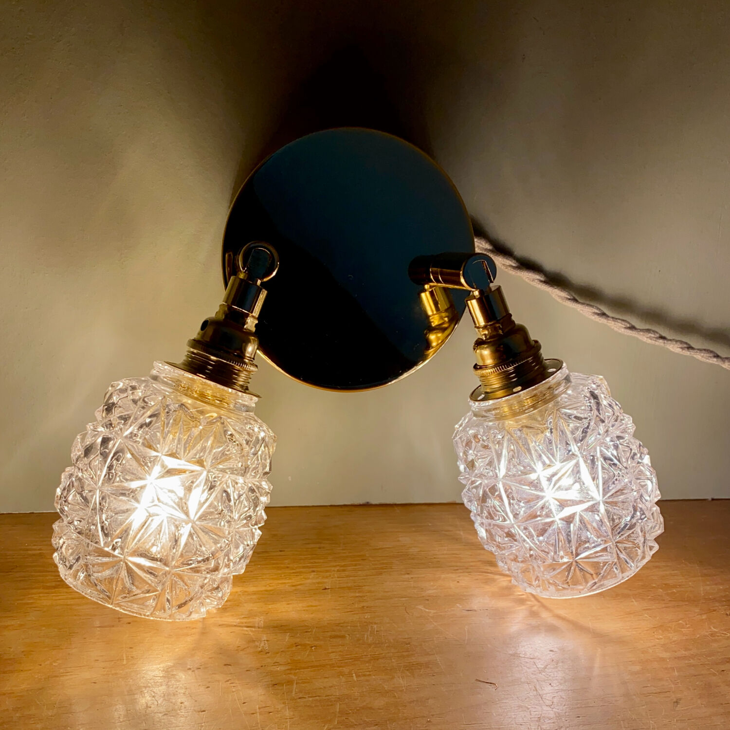 Double vintage tulip wall light in moulded glass.
