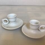 Pair of small white cellar rat candlesticks