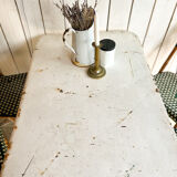 White folding metal bistro table