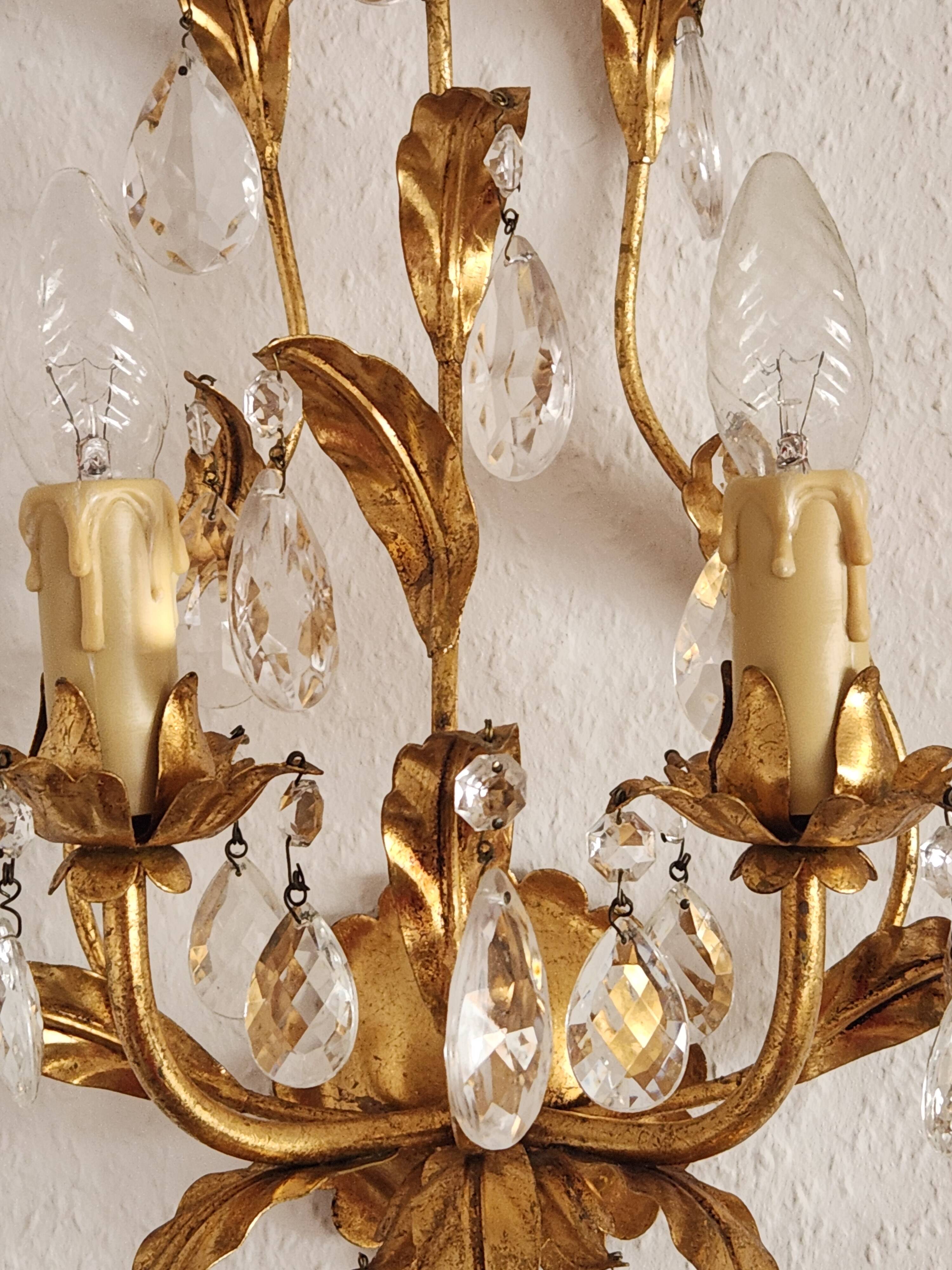 Hand-forged wall lamp gilded with gold leaf and crystals, Italy