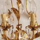 Hand-forged wall lamp gilded with gold leaf and crystals, Italy