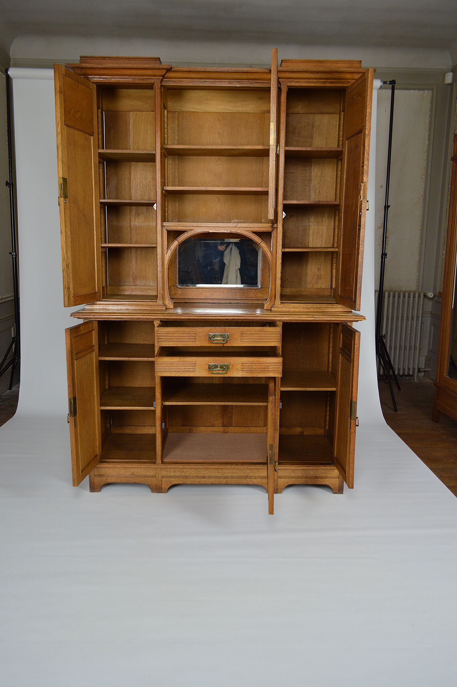Art Nouveau oak buffet and dinanderie panels, circa 1910