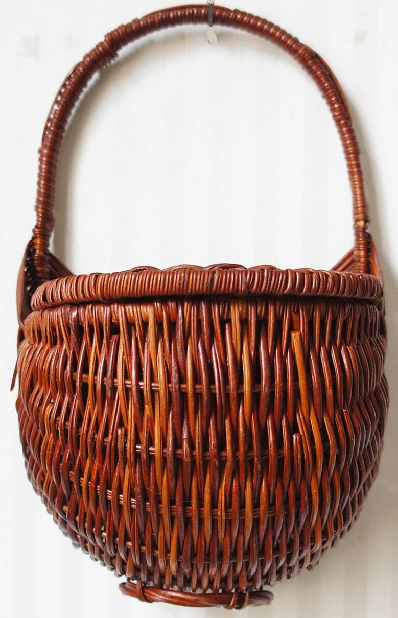 Woven rattan wall basket