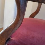 Red voltaire armchair