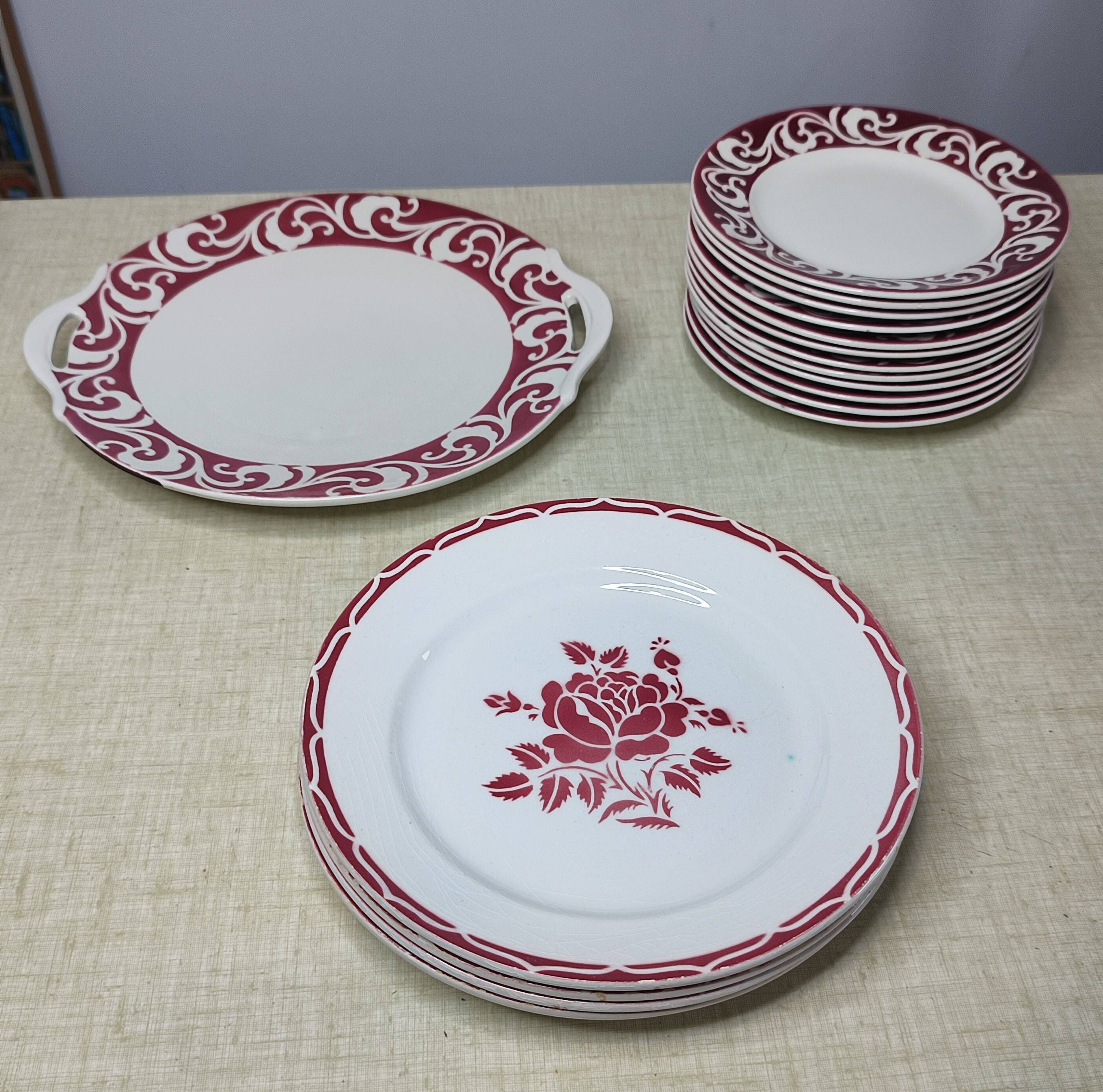Lot of 17 vintage porcelain plates and a platter from the 1940s