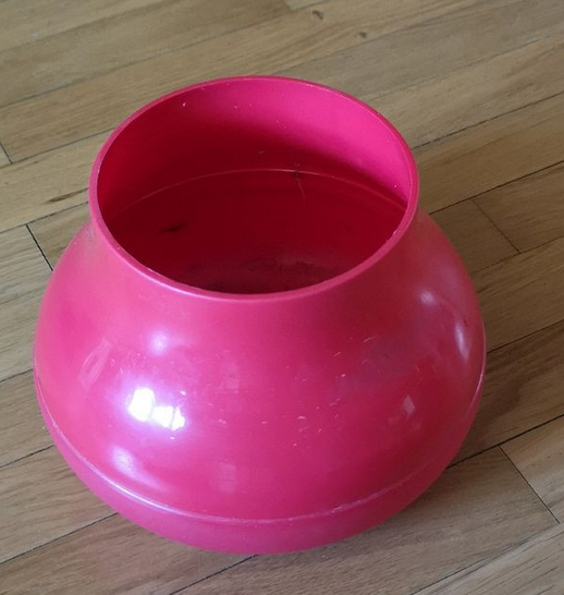 Vintage red plastic vase