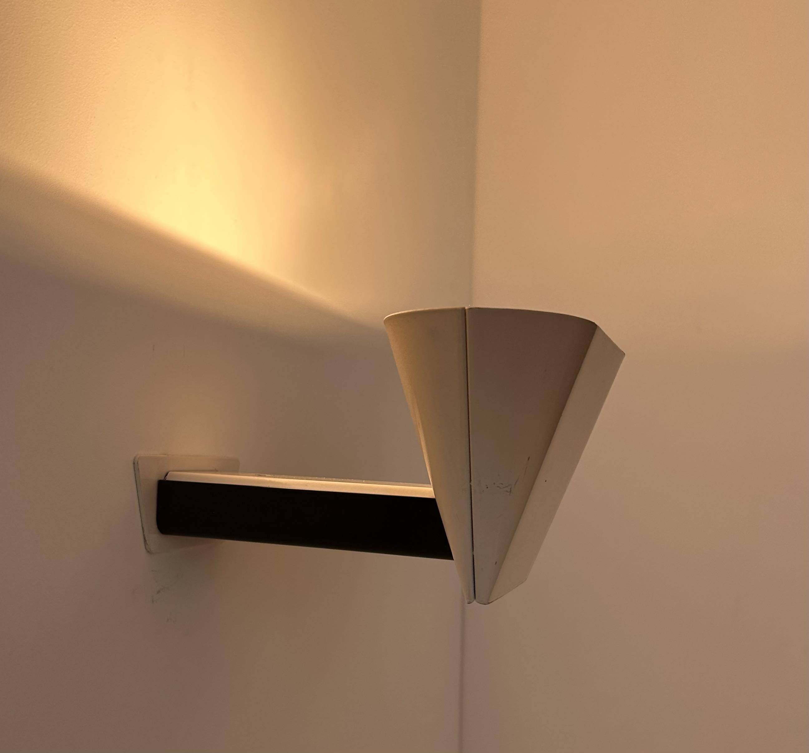 Vintage modernist wall lamp, cream and black lacquered metal, Italy 1970s