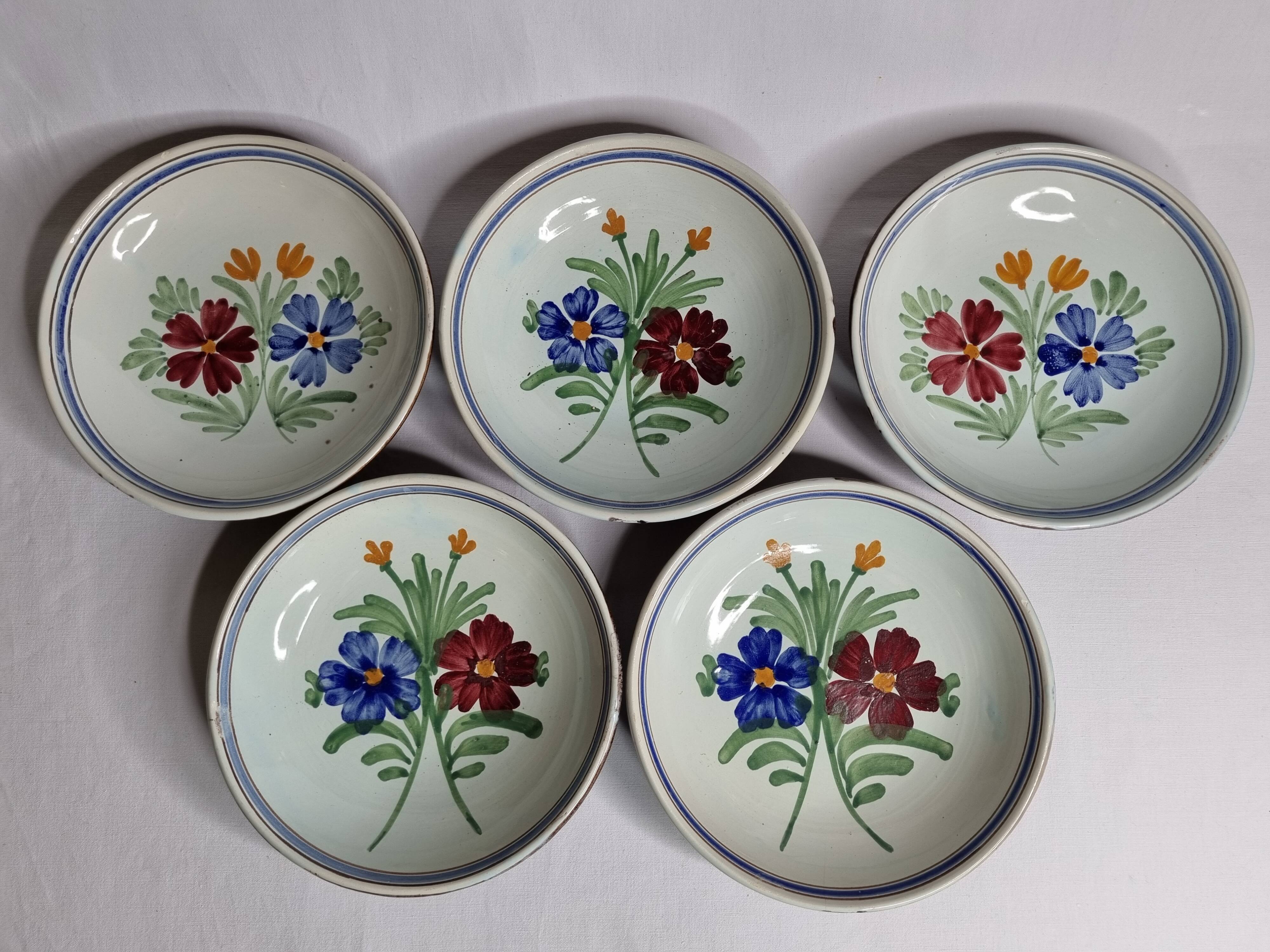 Set of five old hollow plates in glazed ceramic, nineteenth century, 23 cm