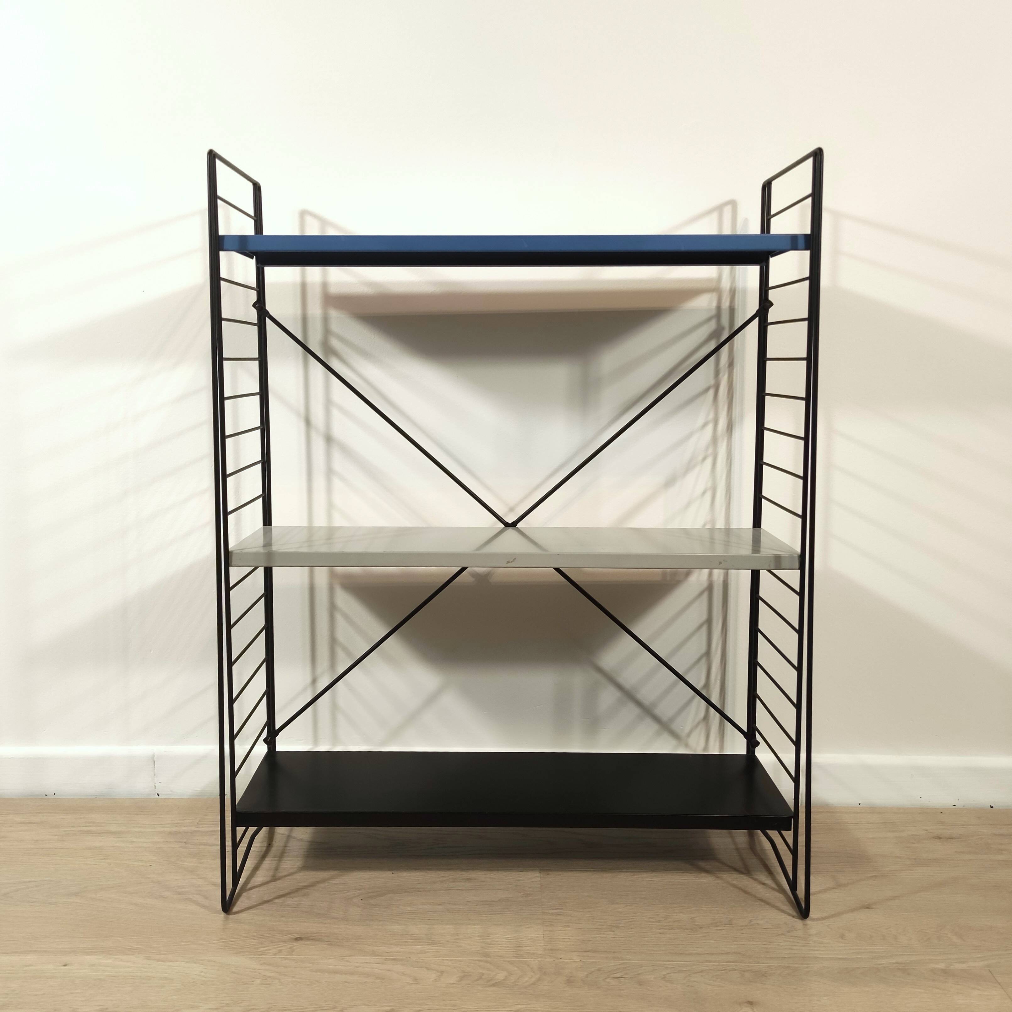 Mid century free standing rack with metal shelves by A. Dekker for Tomado