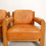 2 fauteuils en chêne et cuir cognac par Skilla