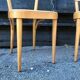 Paire de chaises Baumann en bois et skaÏ jaune vintage