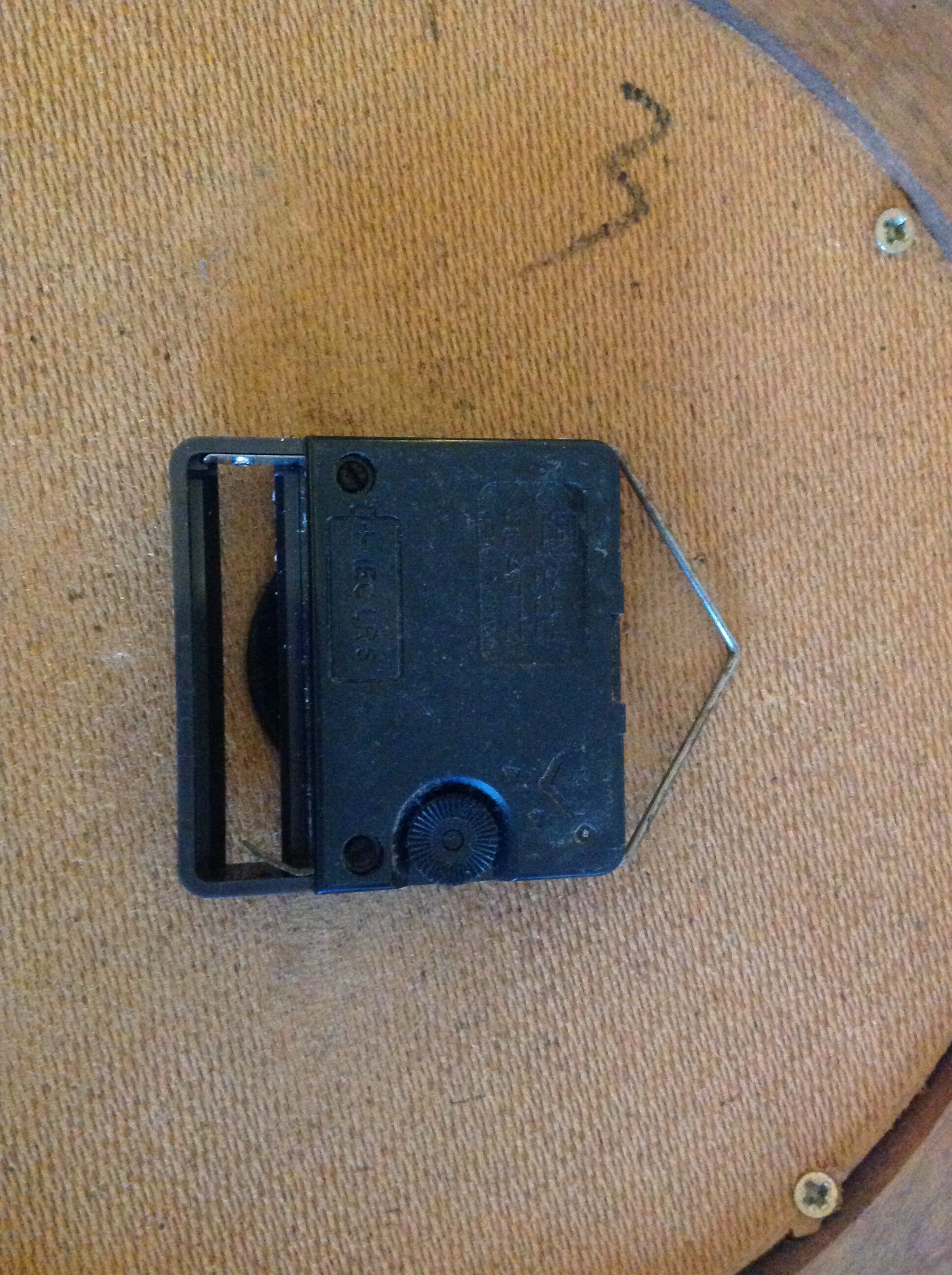 Old round wooden clock, vintage 70