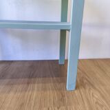 Table basse en pistache des années 60.