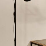 Black floor lamp is gold vintage 1980