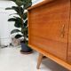 Sideboard with compass feet