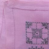 Large vintage linen tablecloth embroidered in pink and 12 matching napkins.