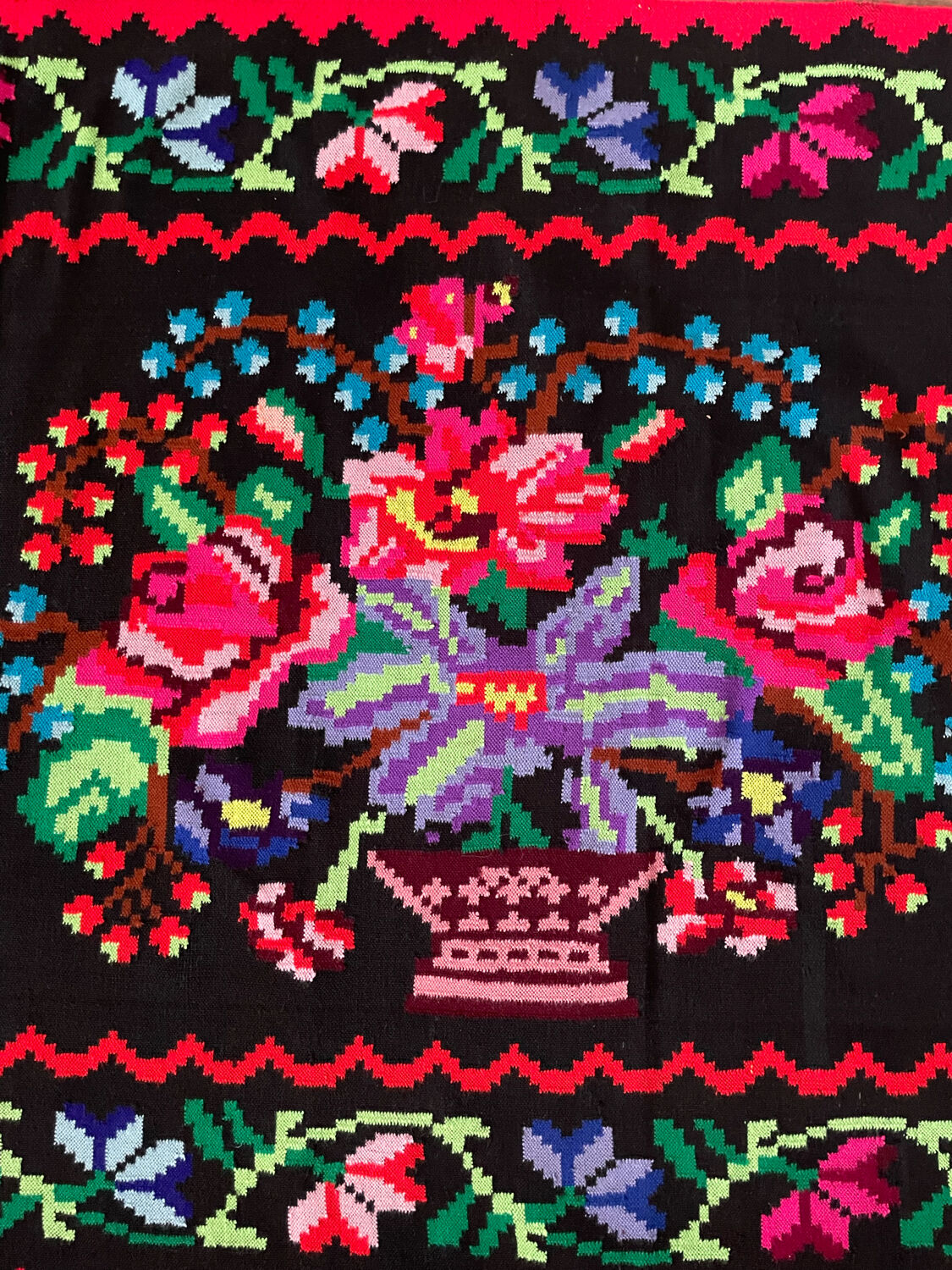 Vintage Romanian handwoven carpet with floral colorful design