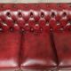 Red leather chesterfield sofa