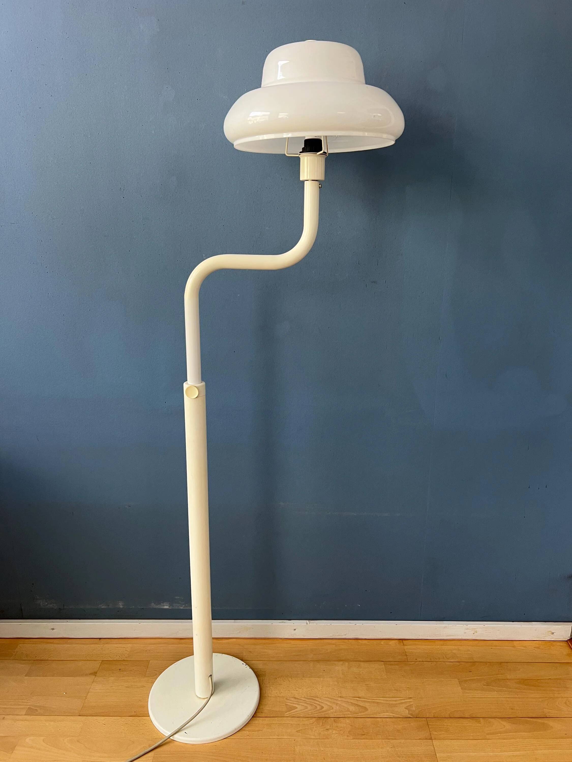 Mid-century mushroom floor lamp with a white plexiglass shade.