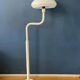 Mid-century mushroom floor lamp with a white plexiglass shade.