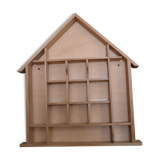 Wooden shelf shaped house