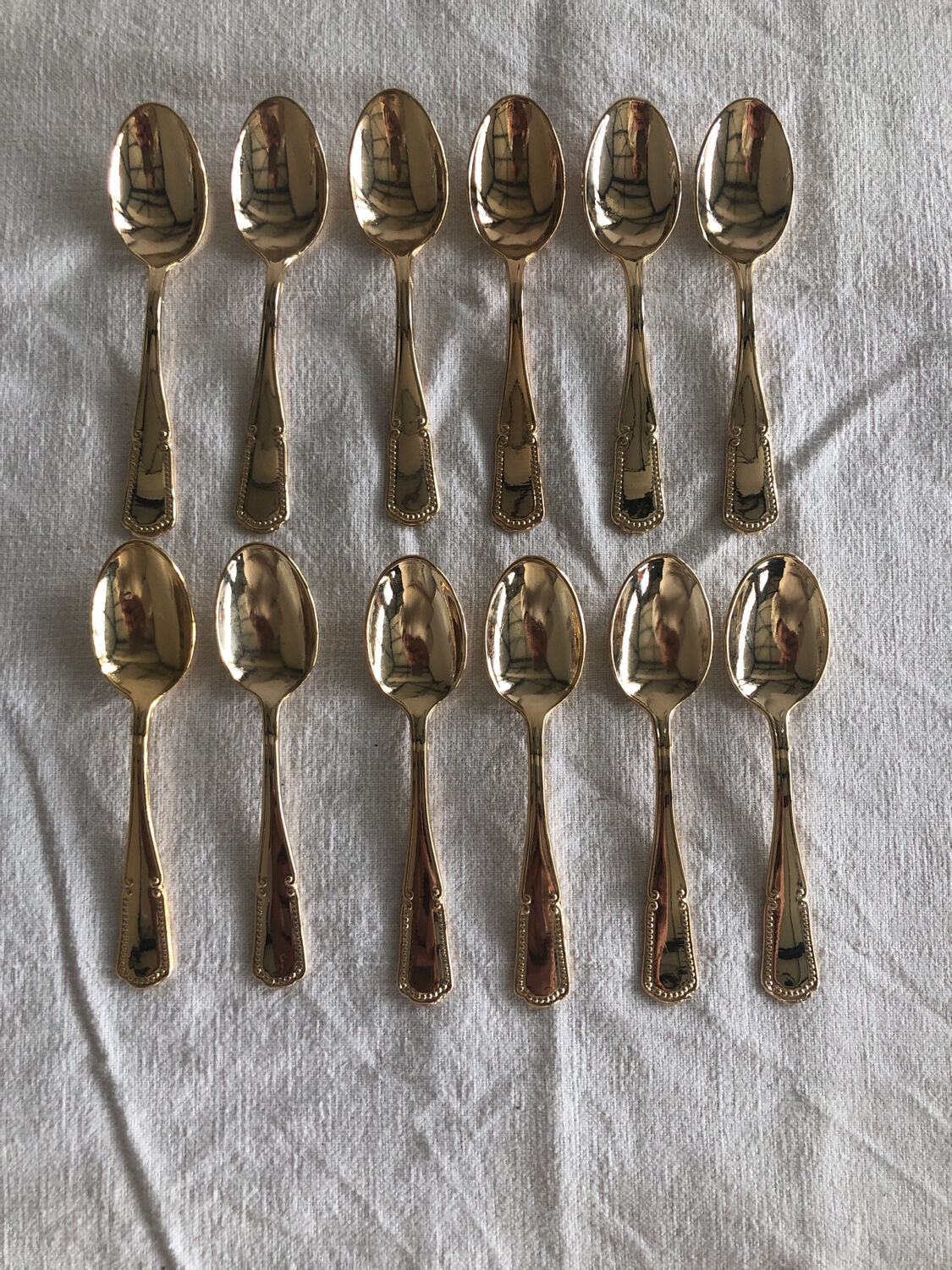 12 small teaspoons in Vintage golden metal