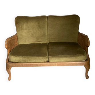 Cane and velvet fabric bench