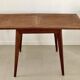 Table porte-feuille avec pieds compas
