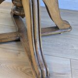 Vintage captain's chair in wood and garnet fabric — a seat with character