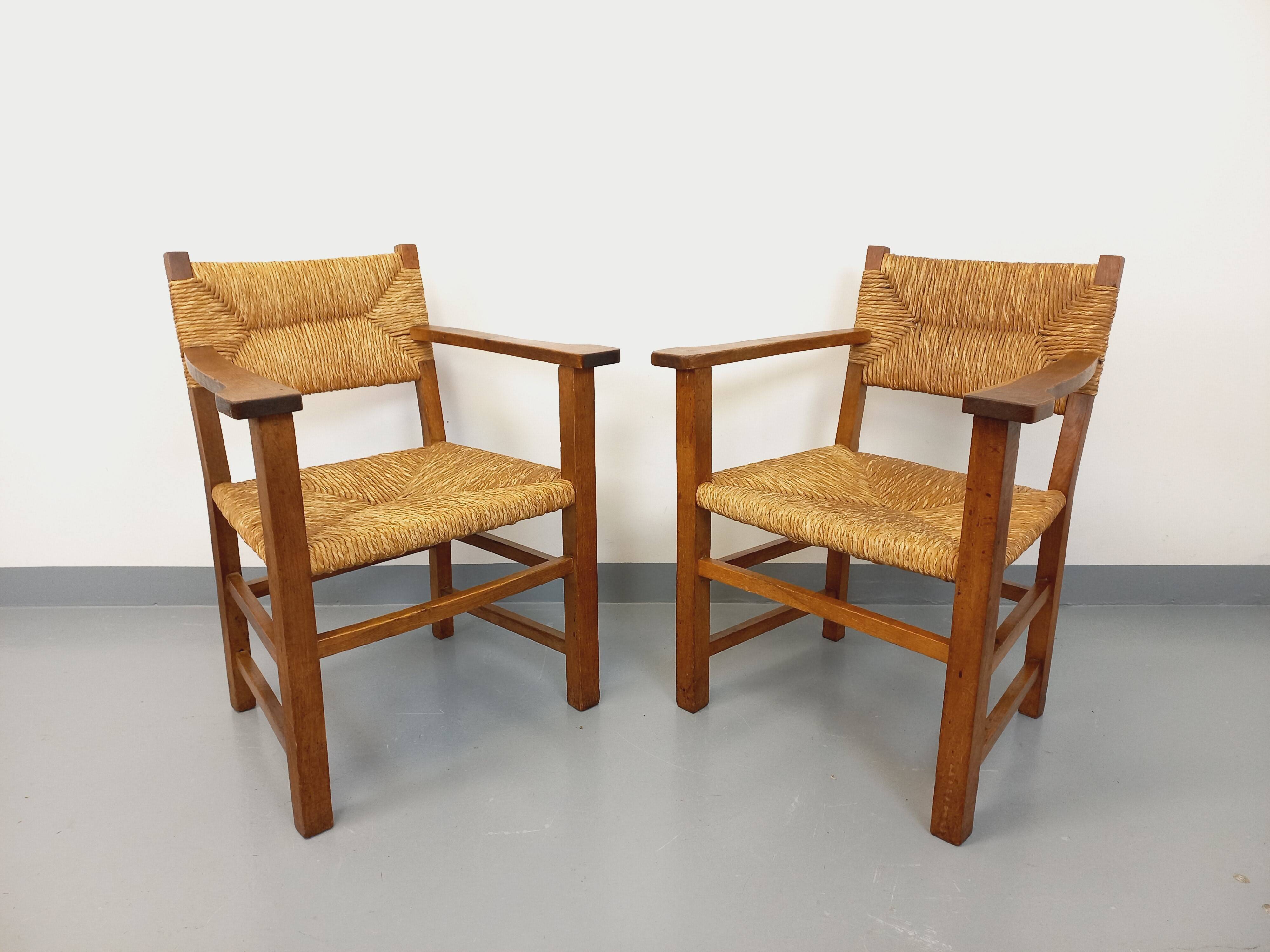 Set of 2 vintage brutalist armchairs in oak wood and straw