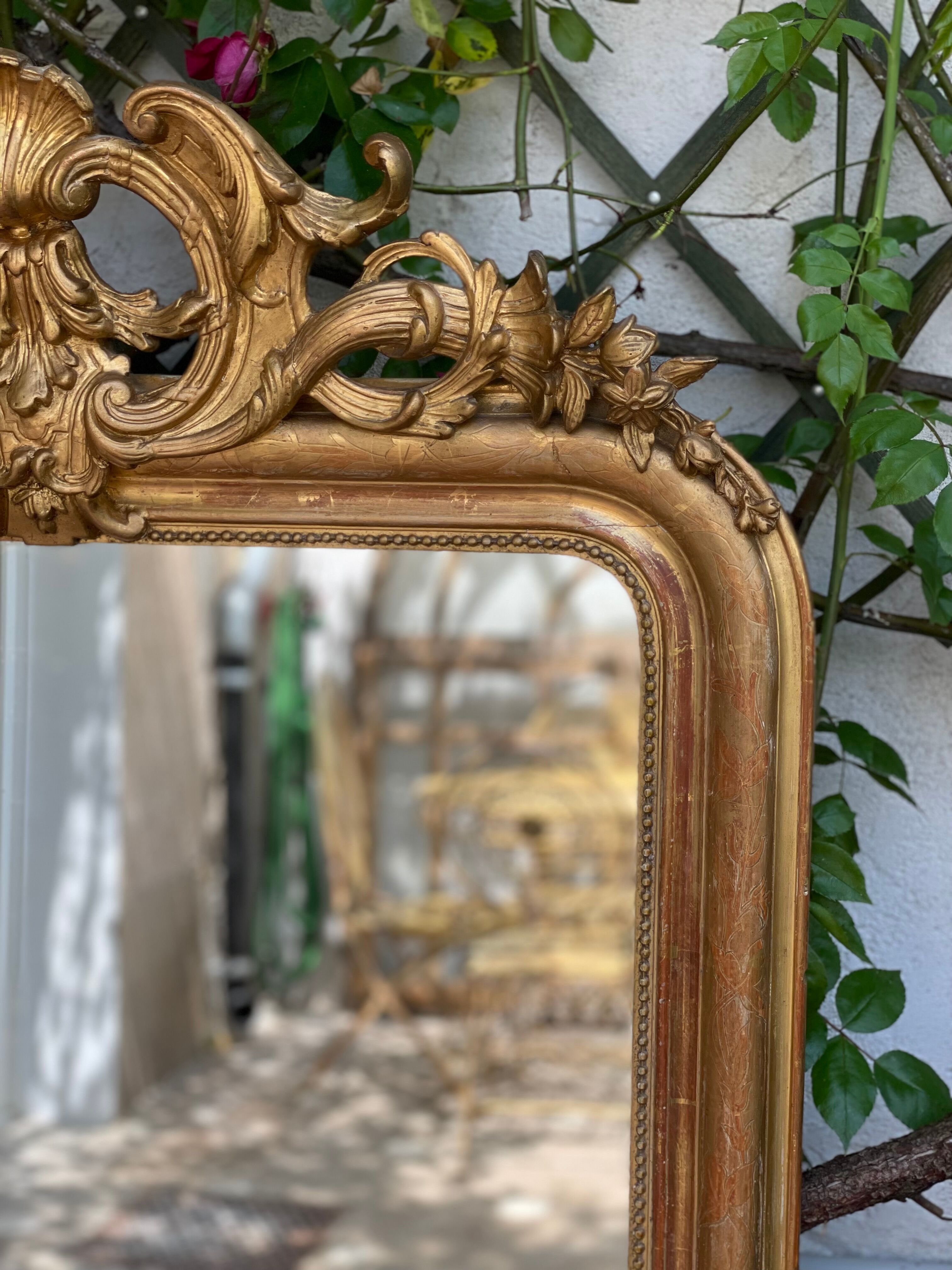 Antique mirror gilded with gold leaf (153x83)