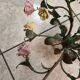 metal chandelier and porcelain flowers