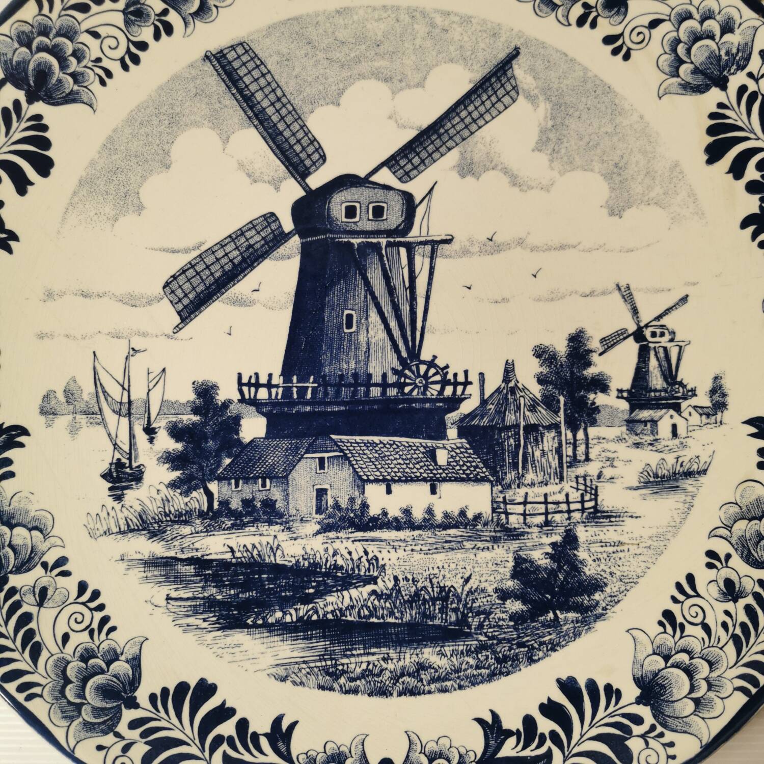 Delft earthenware dish decorated with a mill late 19th early 20th century diameter 39 cm