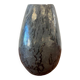 Vintage stone vase with worked fossil