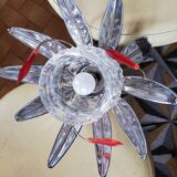 Chandelier with metal leaves and tassels