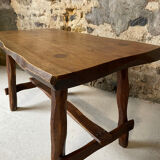 Small rustic table made of solid wood.