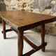 Small rustic table made of solid wood.